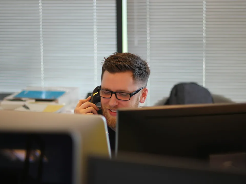 A support agent taking a call
